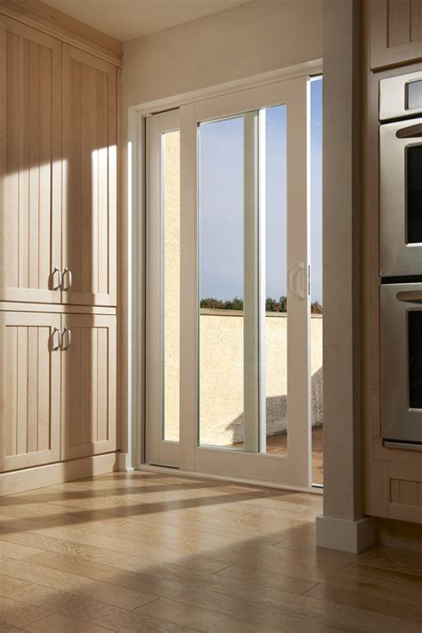 In-Swing <b>French</b> <b>Doors</b> open to the interior of a home and maintain usable space on the outside of the <b>door</b>. . Milgard french doors